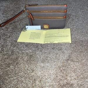 Dooney and Bourke Triple Zip Wristlet in elephant pebbled leather